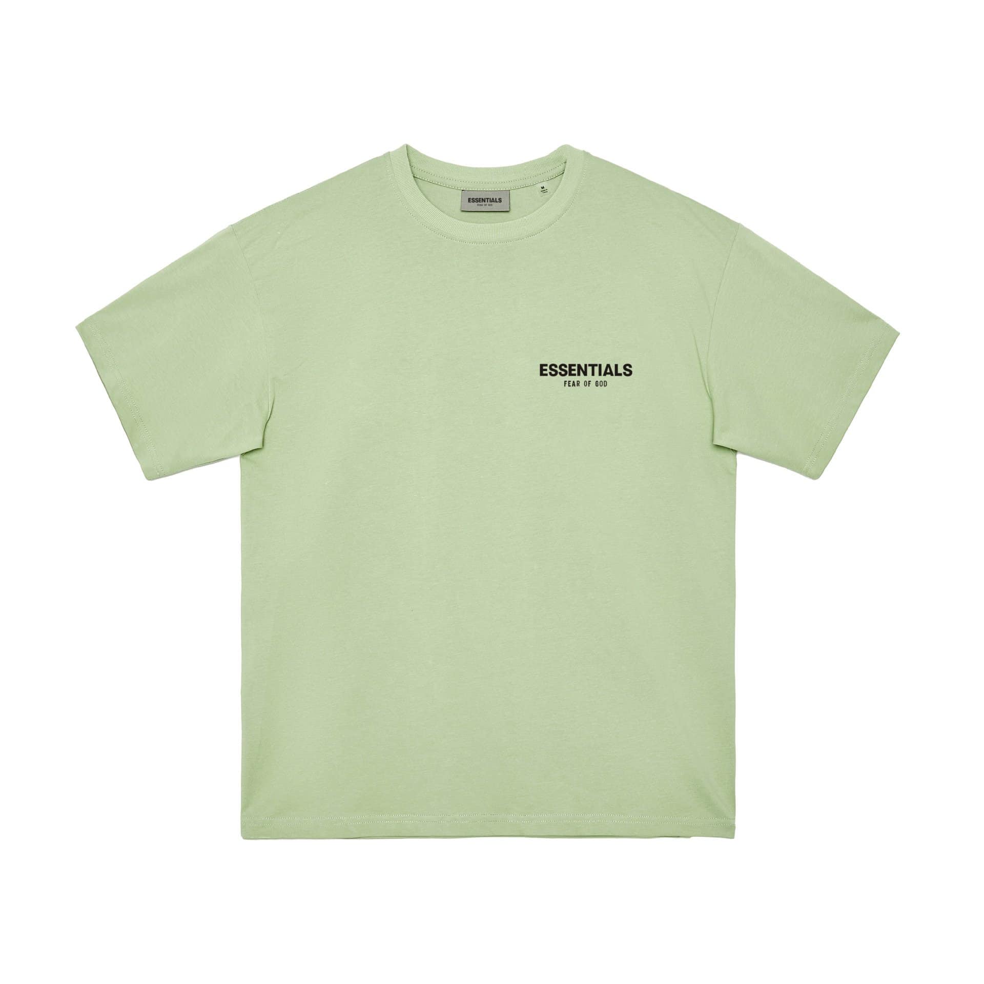 White-green-t-shirt, K-pop merchandise, soft pastel green T-shirt with "ESSENTIALS FEAR OF GOD" text, spacious fit, casual streetwear style, perfect for K-pop fans, stylish and comfortable, simple design for everyday wear.