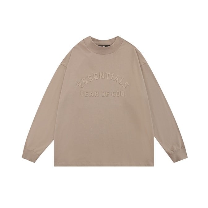 Essential beige oversized sweatshirt with embossed text "ESSENTIALS FEAR OF GOD", perfect for casual K-pop fan everyday wear.