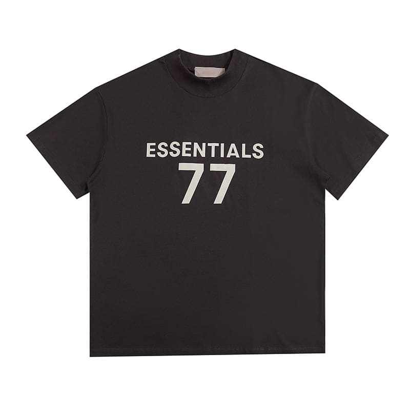 Black kpop merch t-shirt with "ESSENTIALS 77" design, casual streetwear style, unisex, soft fabric, perfect for K-pop fans, trendy fashion item, versatile wardrobe addition, popular among enthusiasts, comfortable and stylish.
