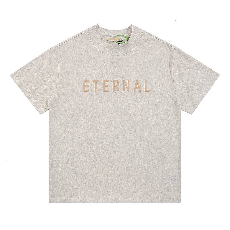 ETERNAL t-shirt with minimalist design, perfect for K-pop merch fans, featuring soft fabric and simple graphics, versatile for everyday wear and fan events.