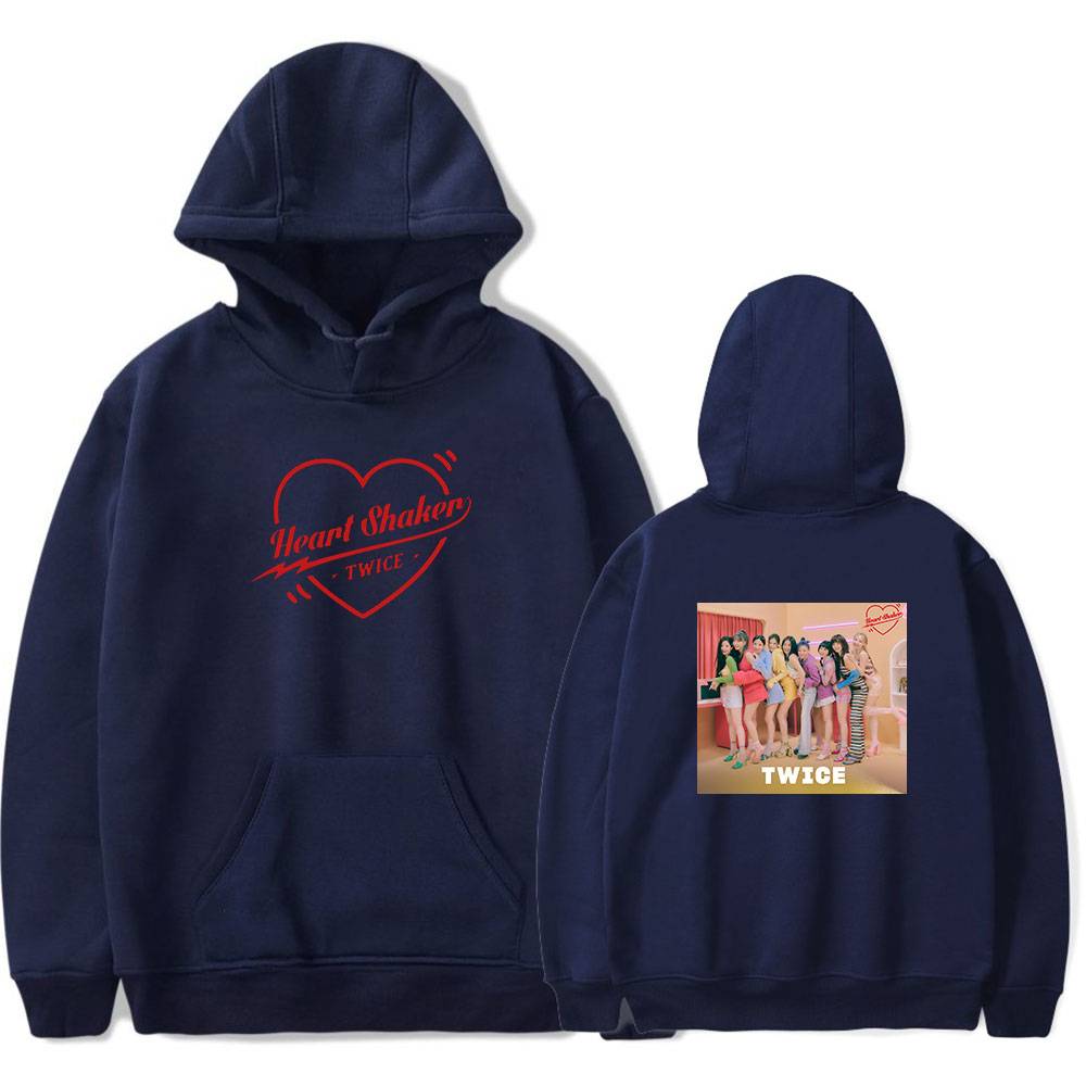 Heart Shaker TWICE hoodie with front heart design and back group photo of TWICE members. Perfect for K-pop fans to show support and love for the popular girl group TWICE. Comfortable and stylish merch item.